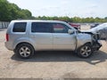 2011 Honda Pilot — photo 13 of 16 | VIN 5FNYF3H76BB028085