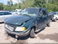 2003 Ford F-150 — photo 2 of 17 | VIN 1FTRX18W63NB37906