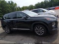 2019 Hyundai Santa Fe — photo 13 of 16 | VIN 5NMS5CAD0KH042085