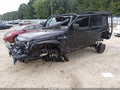 2016 Jeep Wrangler Unlimited — photo 2 of 14 | VIN 1C4BJWDG3GL102790