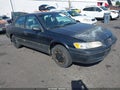 1999 Toyota Camry — photo 1 of 12 | VIN 4T1BG22K6XU452449