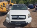 2006 Honda Pilot — photo 12 of 16 | VIN 5FNYF18506B016409