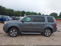 2013 Honda Pilot — photo 14 of 16 | VIN 5FNYF3H59DB010827