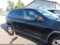 2014 Jeep Cherokee — photo 13 of 16 | VIN 1C4PJLAB9EW314022