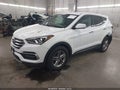2018 Hyundai Santa Fe — photo 2 of 17 | VIN 5NMZTDLB3JH094136
