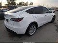 2020 Tesla Model Y — photo 4 of 15 | VIN 5YJYGDEE4LF026374