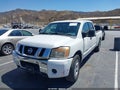 2008 Nissan Titan — photo 2 of 17 | VIN 1N6AA07G48N345936