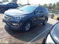 2017 Hyundai Santa Fe — photo 2 of 16 | VIN 5NMZU3LB9HH010726