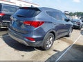 2017 Hyundai Santa Fe — photo 4 of 16 | VIN 5NMZU3LB9HH010726