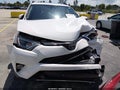 2018 Toyota RAV4 — photo 13 of 17 | VIN JTMWFREV6JJ210986