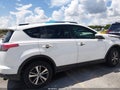 2018 Toyota RAV4 — photo 14 of 17 | VIN JTMWFREV6JJ210986