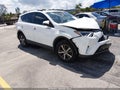 2018 Toyota RAV4 — photo 1 of 17 | VIN JTMWFREV6JJ210986