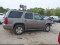 2011 Chevrolet Tahoe — photo 13 of 16 | VIN 1GNSCAE07BR337205