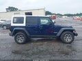 2013 Jeep Wrangler Unlimited — photo 13 of 16 | VIN 1C4HJWFG0DL560211