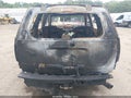 2014 Chevrolet Tahoe — photo 12 of 13 | VIN 1GNSCBE04ER142480