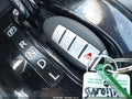 2015 Nissan Rogue — photo 11 of 16 | VIN 5N1AT2MV3FC877811
