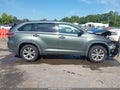 2015 Toyota Highlander — photo 13 of 16 | VIN 5TDBKRFH3FS099410