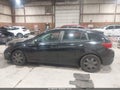 2018 Subaru Impreza — photo 13 of 15 | VIN 4S3GTAA65J3720957