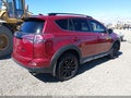 2018 Toyota RAV4 — photo 4 of 20 | VIN 2T3RFREV9JW787722