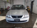2002 Mazda Protege — photo 12 of 16 | VIN JM1BJ225121631086