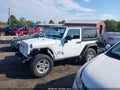 2014 Jeep Wrangler — photo 15 of 18 | VIN 1C4AJWAG0EL314754