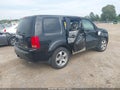 2014 Honda Pilot — photo 4 of 16 | VIN 5FNYF4H57EB051190