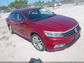 2017 Volkswagen Passat — photo 1 of 16 | VIN 1VWGT7A33HC002730