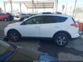 2018 Toyota RAV4 — photo 13 of 16 | VIN JTMWFREV6JJ163667