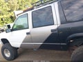 1994 GMC Suburban — photo 14 of 16 | VIN 1GKFK16K7RJ762918