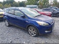 2014 Ford Escape — photo 14 of 17 | VIN 1FMCU9JXXEUC18654