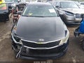 2018 Kia Optima — photo 13 of 17 | VIN 5XXGT4L35JG210872