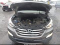 2014 Hyundai Santa Fe — photo 10 of 16 | VIN 5XYZU3LB8EG139045