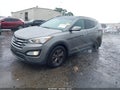 2014 Hyundai Santa Fe — photo 2 of 16 | VIN 5XYZU3LB8EG139045