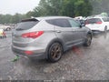 2014 Hyundai Santa Fe — photo 4 of 16 | VIN 5XYZU3LB8EG139045