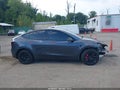 2022 Tesla Model Y — photo 13 of 20 | VIN 7SAYGDEE1NF377894