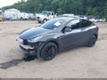 2022 Tesla Model Y — photo 2 of 20 | VIN 7SAYGDEE1NF377894