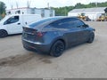2022 Tesla Model Y — photo 4 of 20 | VIN 7SAYGDEE1NF377894