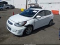 2013 Hyundai Accent — photo 2 of 16 | VIN KMHCU5AE6DU111736