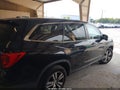 2016 Honda Pilot — photo 14 of 17 | VIN 5FNYF6H58GB038527