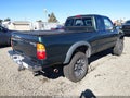 2002 Toyota Tacoma — photo 4 of 14 | VIN 5TEWM72N62Z087518