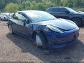2022 Tesla Model 3 — photo 1 of 15 | VIN 5YJ3E1EB4NF305167