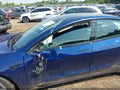 2022 Tesla Model 3 — photo 6 of 15 | VIN 5YJ3E1EB4NF305167