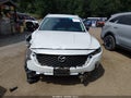 2024 Mazda CX-50 — photo 12 of 16 | VIN 7MMVABAM2RN219106