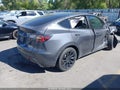 2021 Tesla Model Y — photo 4 of 14 | VIN 5YJYGAEE9MF214078
