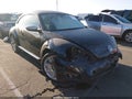 2013 Volkswagen Beetle — photo 1 of 17 | VIN 3VWJP7AT5DM657426