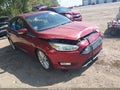 2016 Ford Focus — photo 1 of 16 | VIN 1FADP3N24GL225917