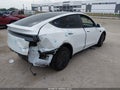2026 Tesla Model Y — photo 4 of 19 | VIN 7SAYGAEE4TF624711