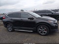 2017 Honda CR-V — photo 13 of 16 | VIN 2HKRW2H52HH640694