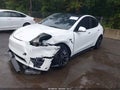 2023 Tesla Model Y — photo 2 of 19 | VIN 7SAYGDEFXPF708340