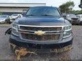 2019 Chevrolet Suburban — photo 12 of 16 | VIN 1GNSKHKCXKR392080